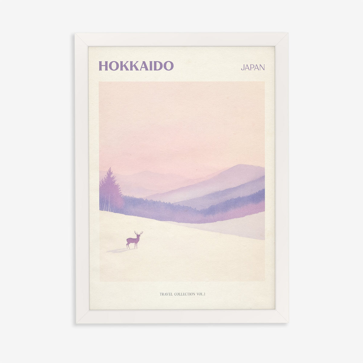 Hokkaido travel print of a lone deer in deep snow below soft pink and lilac hills, in a white frame on a plain wall