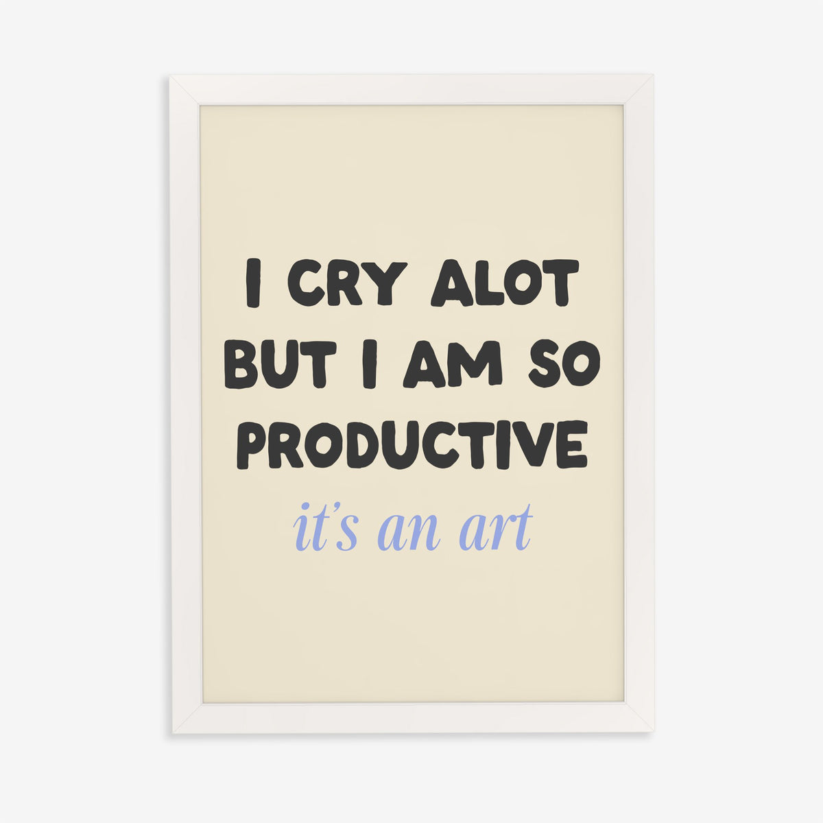 I Cry A Lot But I’m So Productive Taylor Swift lyric print of black and blue lettering on cream, in a white frame on a plain wall