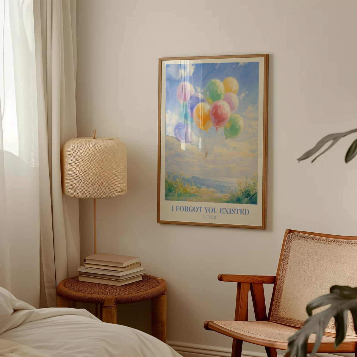 I Forgot You Existed Taylor Swift print of pastel balloons floating over the sea, framed above a side table and lamp