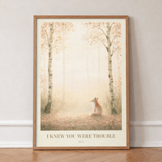 I Knew You Were Trouble Taylor Swift print of a fox in a birch wood, in an oak frame, leaning against a wall on a herringbone floor