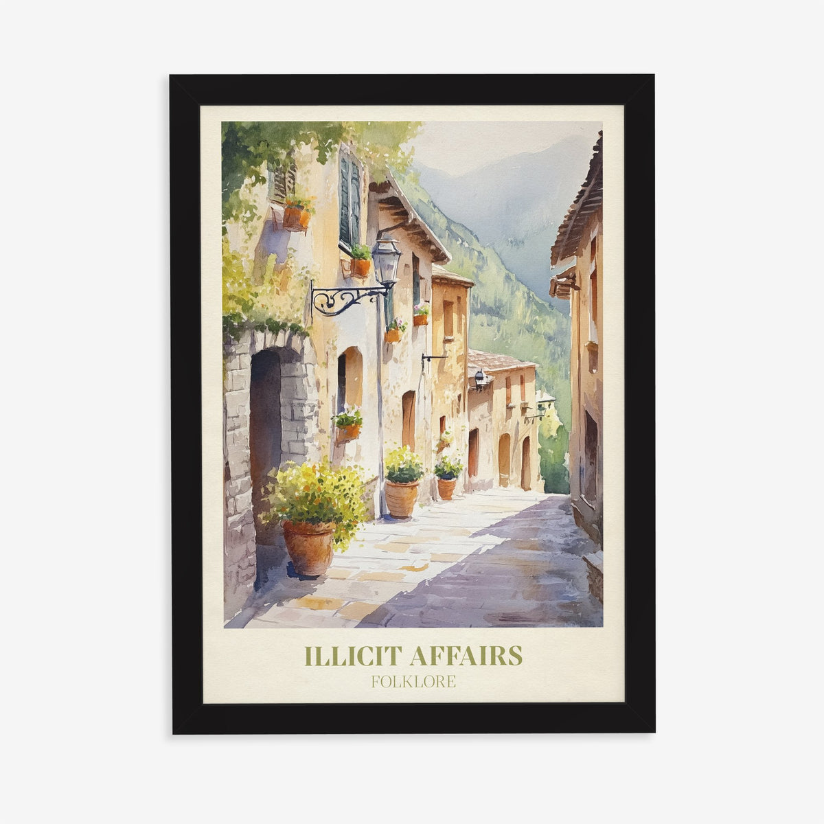 Illicit Affairs Taylor Swift print of a cobbled lane of stone houses and flowerpots, in a black frame on a plain wall