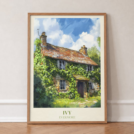 Ivy Taylor Swift print of an ivy-covered stone cottage under a blue sky, in an oak frame, leaning against a wall on a herringbone floor