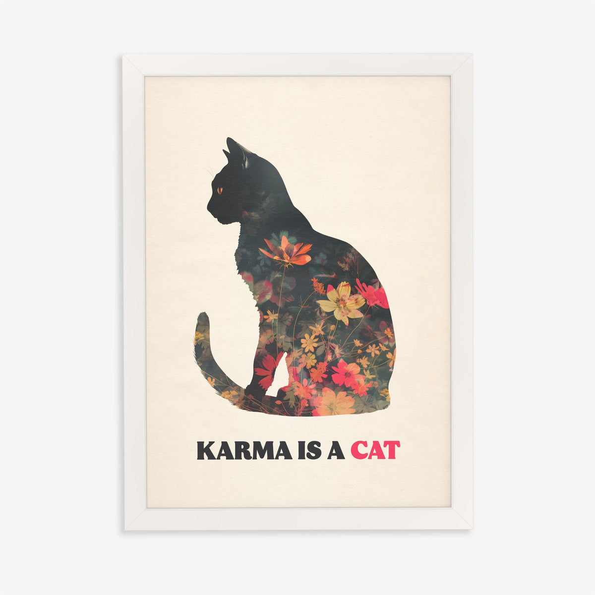 Karma Is A Cat Taylor Swift print of a black cat silhouette filled with red and orange flowers, in a white frame on a plain wall