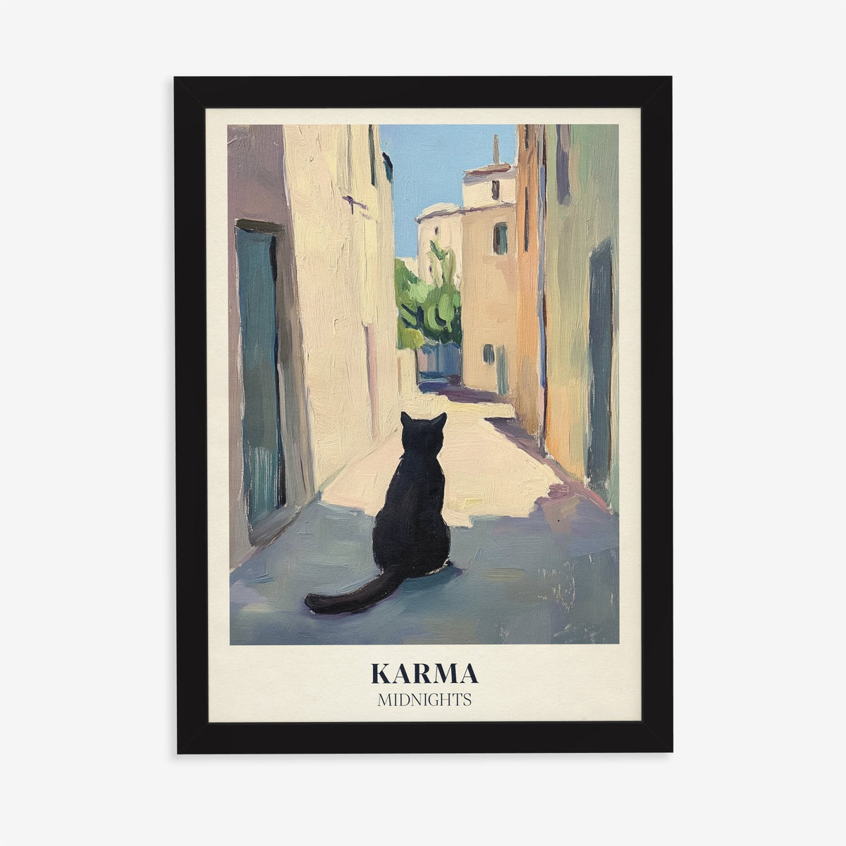 Karma Matisse Taylor Swift print of a black cat sitting in a sunny old-town street, in a black frame on a plain wall