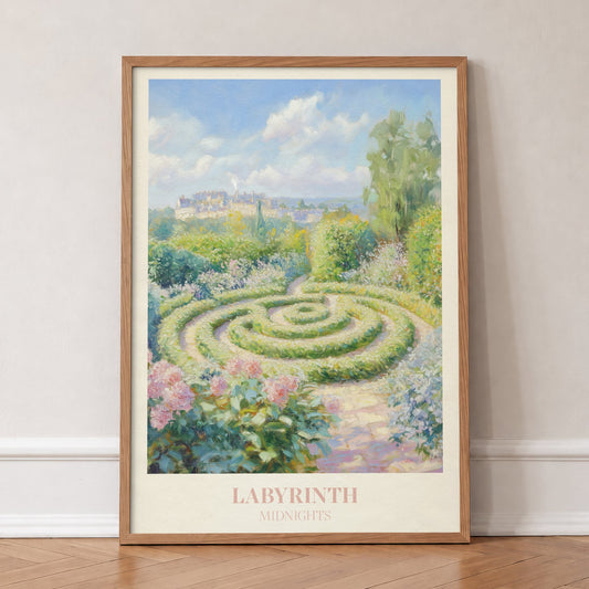 Labyrinth Taylor Swift print of a round hedge maze in a sunny garden of pink flowers, in an oak frame, leaning against a wall on a herringbone floor