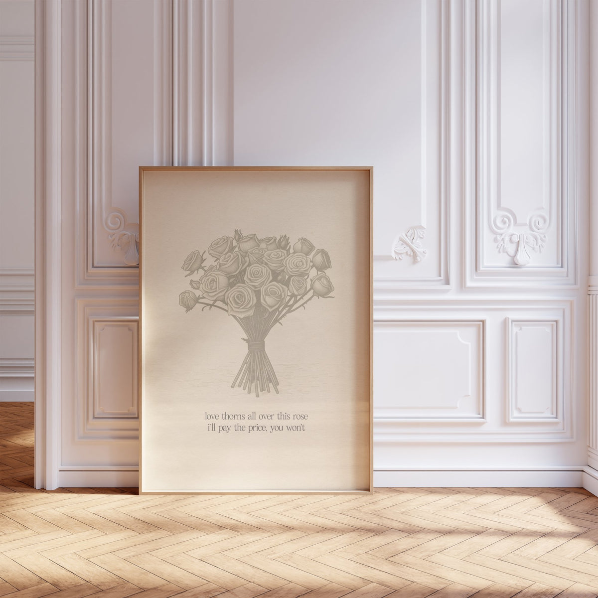 Love Thorns All Over Taylor Swift print of a sketched bunch of roses on cream paper, framed, leaning against a white panelled wall