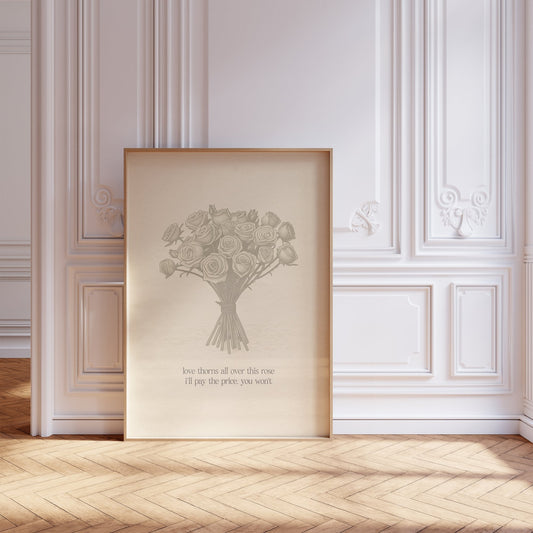Love Thorns All Over Taylor Swift print of a sketched bunch of roses on cream paper, framed, leaning against a white panelled wall