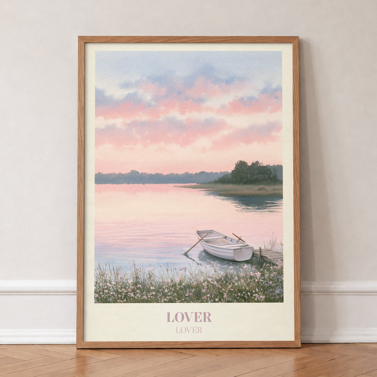 Lover Taylor Swift print of a rowing boat on a pink lake, in an oak frame, leaning against a wall on a herringbone floor