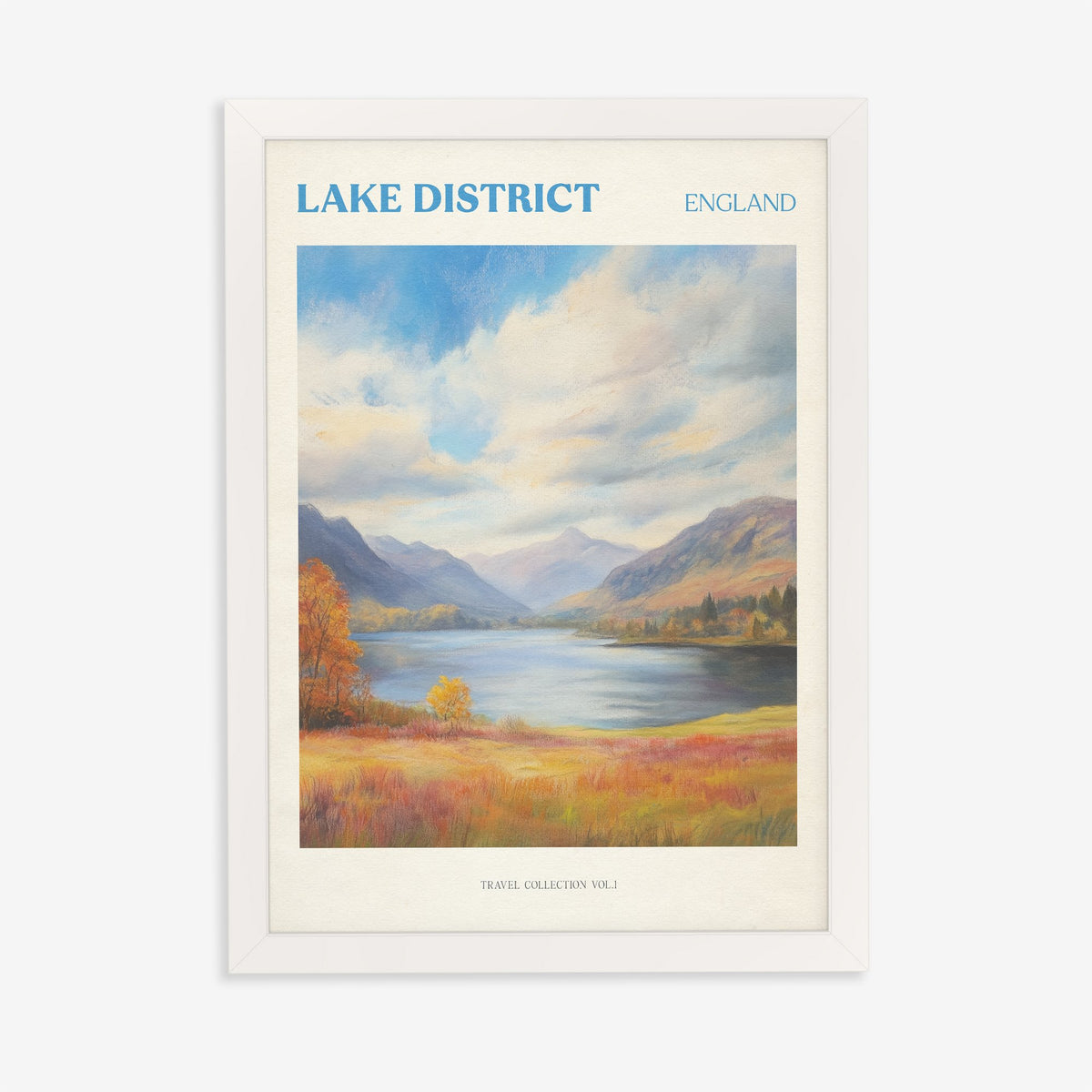 Lake District travel print of a lake between mountains under big clouds, with orange autumn grass, in a white frame on a plain wall