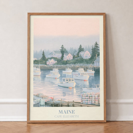 Maine Noah Kahan print of lobster boats in a misty pink harbour, in an oak frame, leaning against a wall