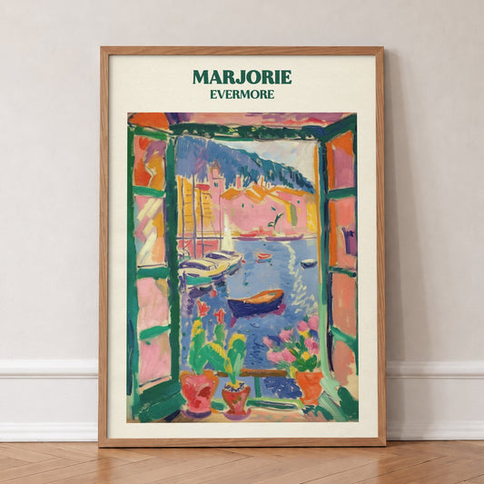 Marjorie Taylor Swift print of a Matisse-style open window onto a harbour of boats, in an oak frame, leaning against a wall on a herringbone floor