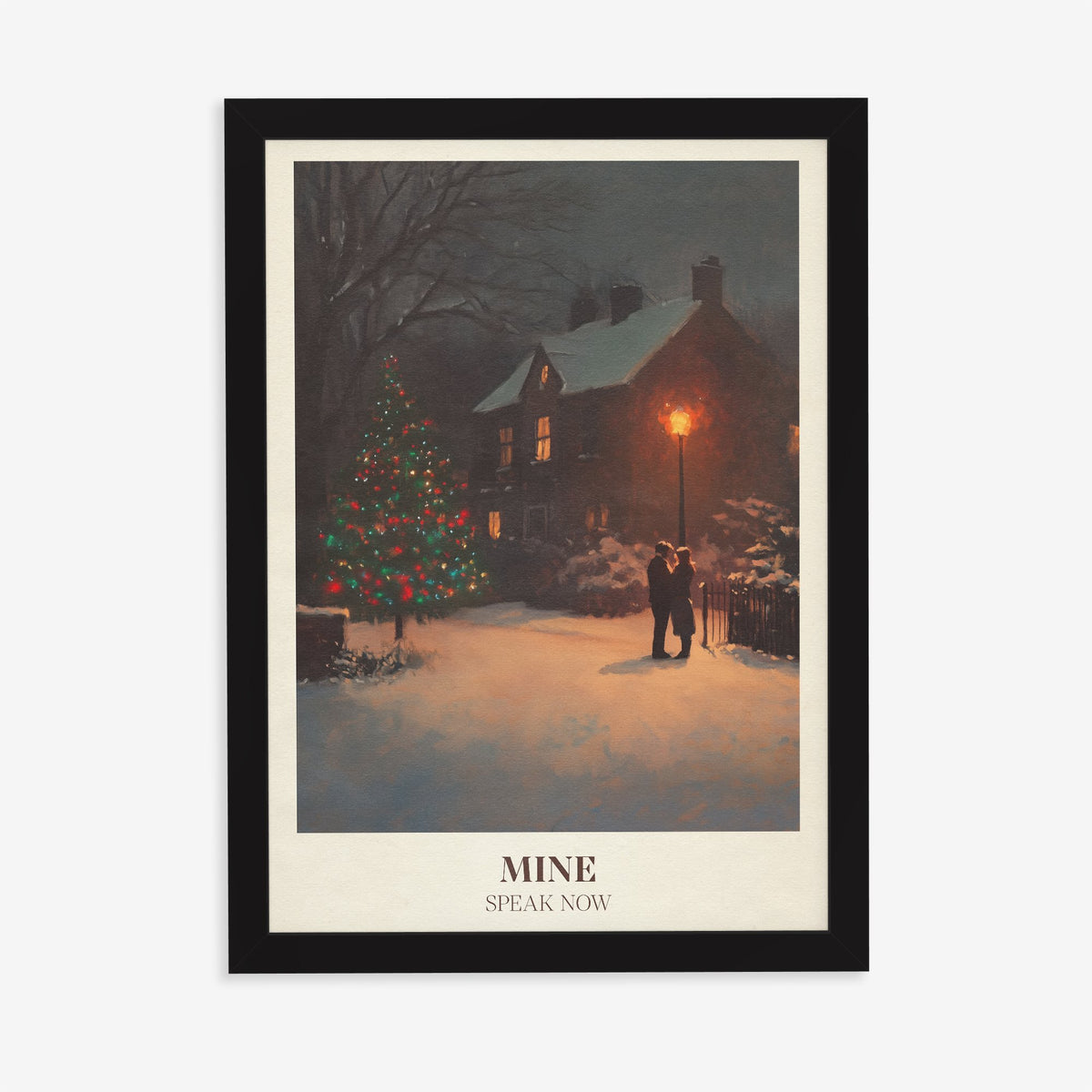 Mine Christmas Taylor Swift print of a couple by a lit Christmas tree in the snow, in a black frame on a plain wall
