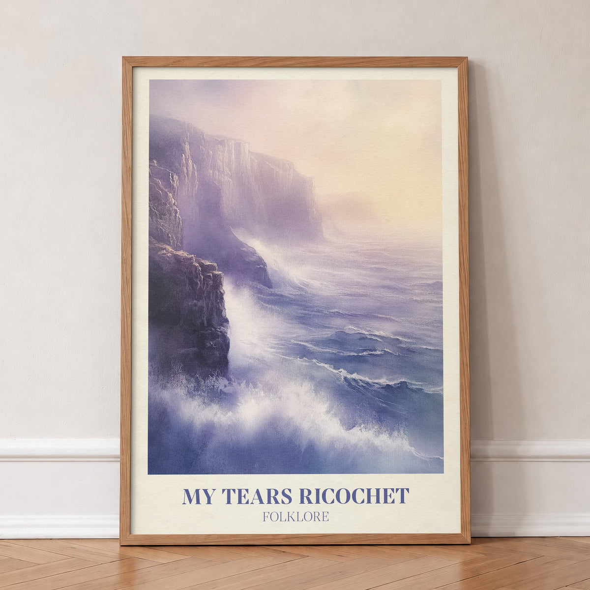 My Tears Ricochet Taylor Swift print of waves crashing against misty purple sea cliffs, in an oak frame, leaning against a wall on a herringbone floor
