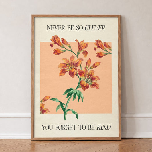 Never Be So Clever Taylor Swift lyric print of orange lilies on warm peach, in an oak frame, leaning against a wall on a herringbone floor