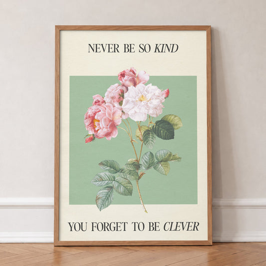 Never Be So Kind Taylor Swift lyric print of pink and white roses on sage green, in an oak frame, leaning against a wall on a herringbone floor