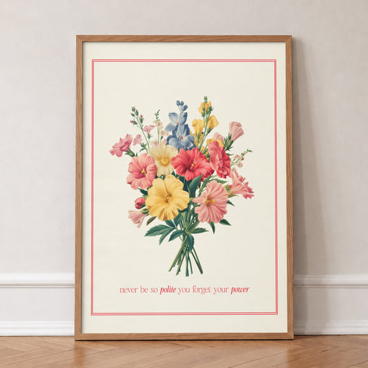 Never Be So Polite Floral Taylor Swift print of a bright vintage bouquet inside a red border, in an oak frame, leaning against a wall on a herringbone floor