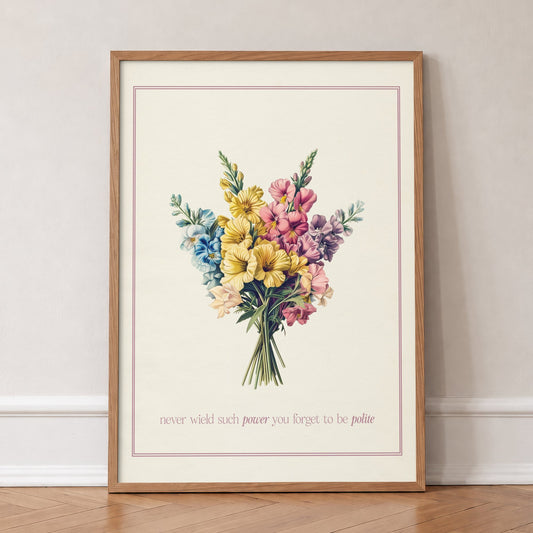 Never Wield Such Power Floral Taylor Swift print of a vintage bouquet inside a mauve border, in an oak frame, leaning against a wall on a herringbone floor