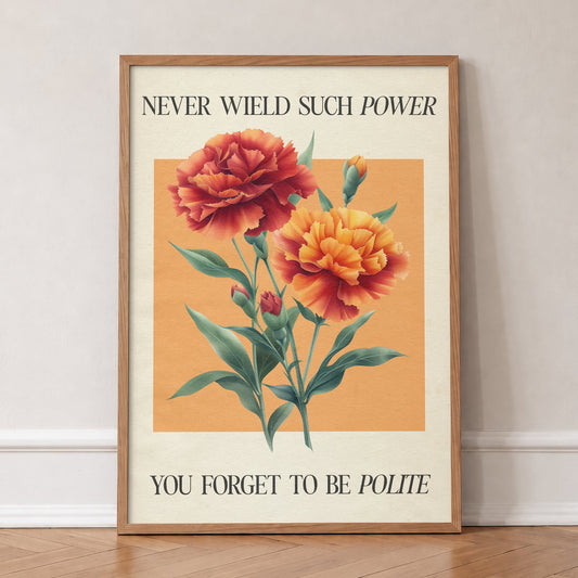 Never Wield Such Power Taylor Swift print of red and orange carnations between lines of lyric, in an oak frame, leaning against a wall on a herringbone floor