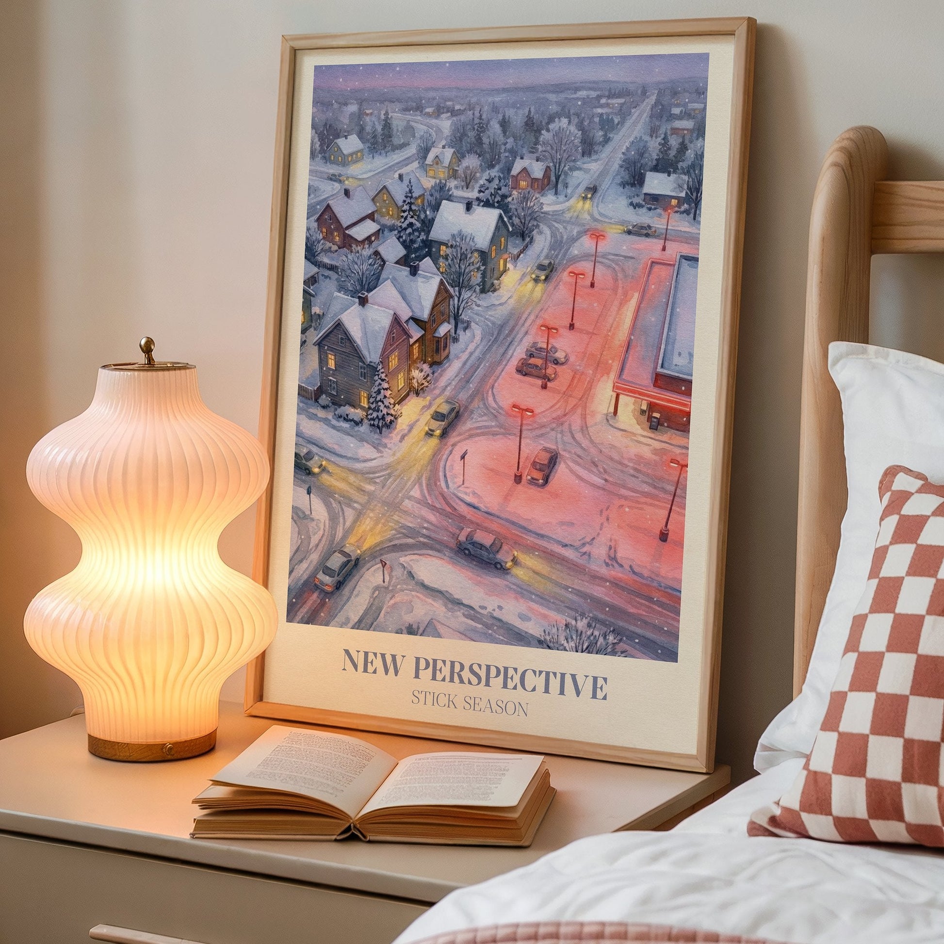 New Perspective lyric wall art print inspired by Noah Kahan on a bedside table next to a lamp