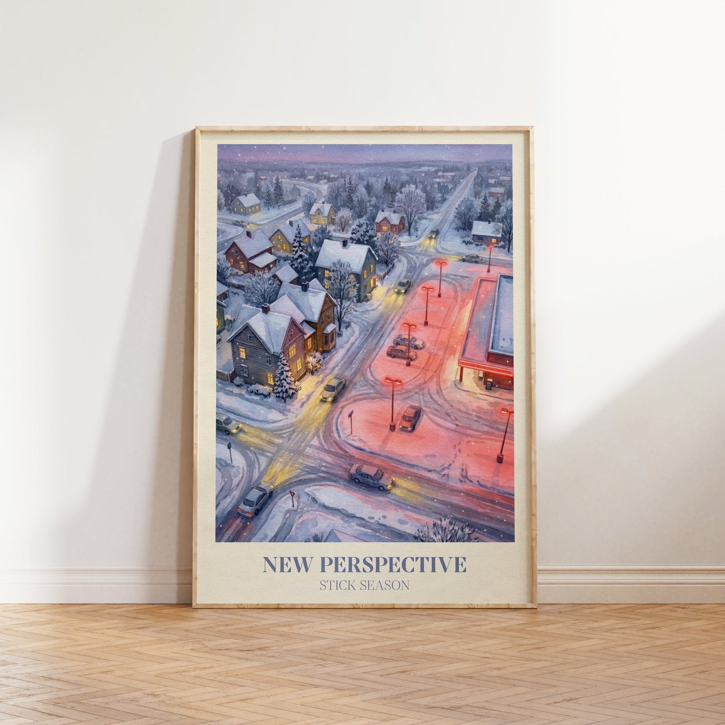 New Perspective lyric wall art print inspired by Noah Kahan leaning against a white wall on a wooden herringbone floor in soft daylight