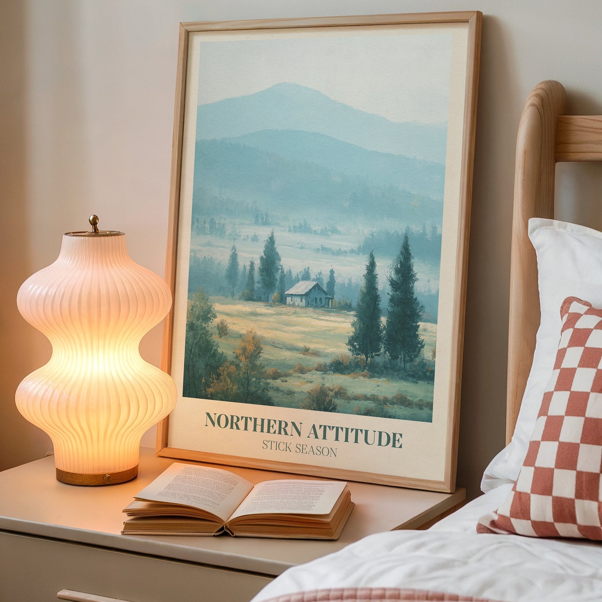 Northern Attitude lyric wall art print inspired by Noah Kahan on a bedside table next to a lamp