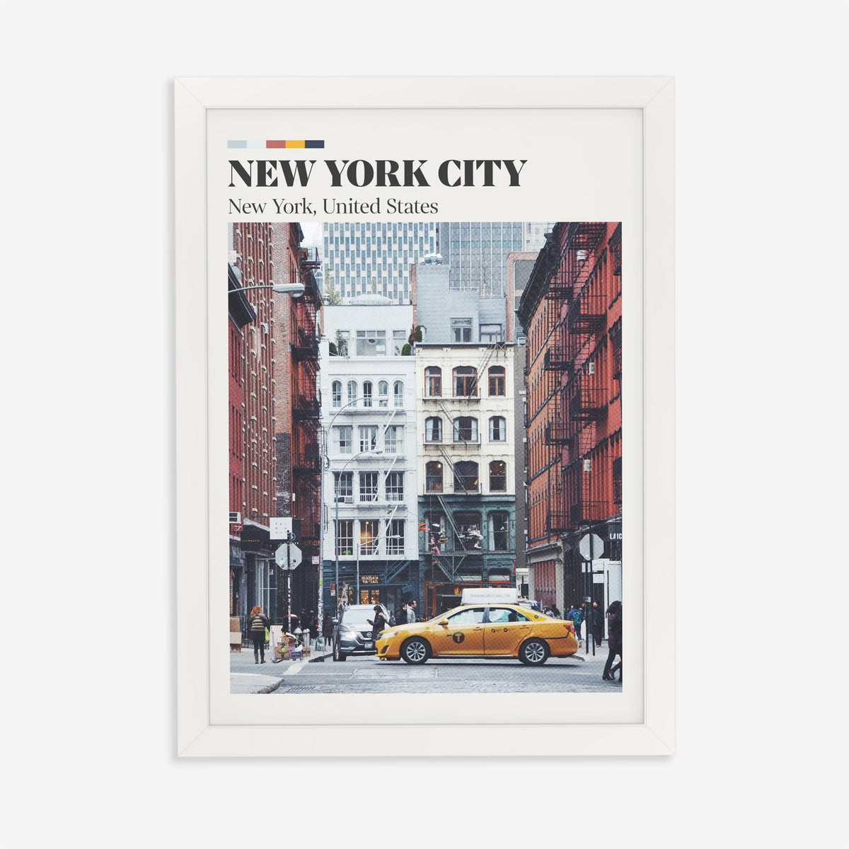 New York City travel print of an old brick street with fire escapes and a yellow taxi, in a white frame on a plain wall