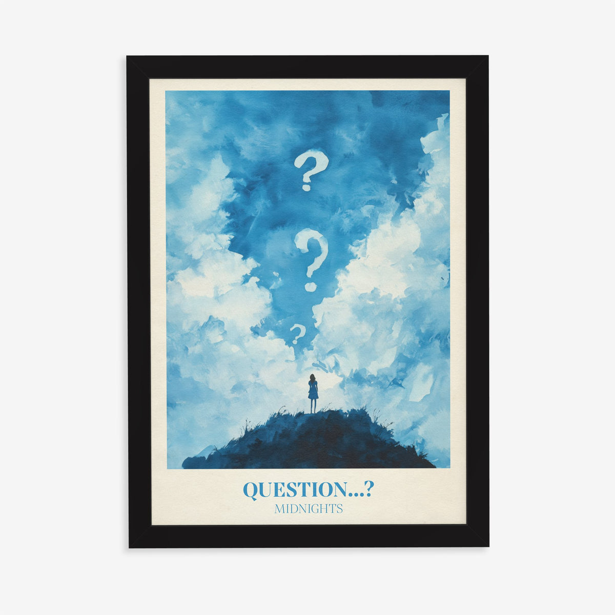 Question Taylor Swift print of a lone figure on a hill under clouds and question marks, in a black frame on a plain wall