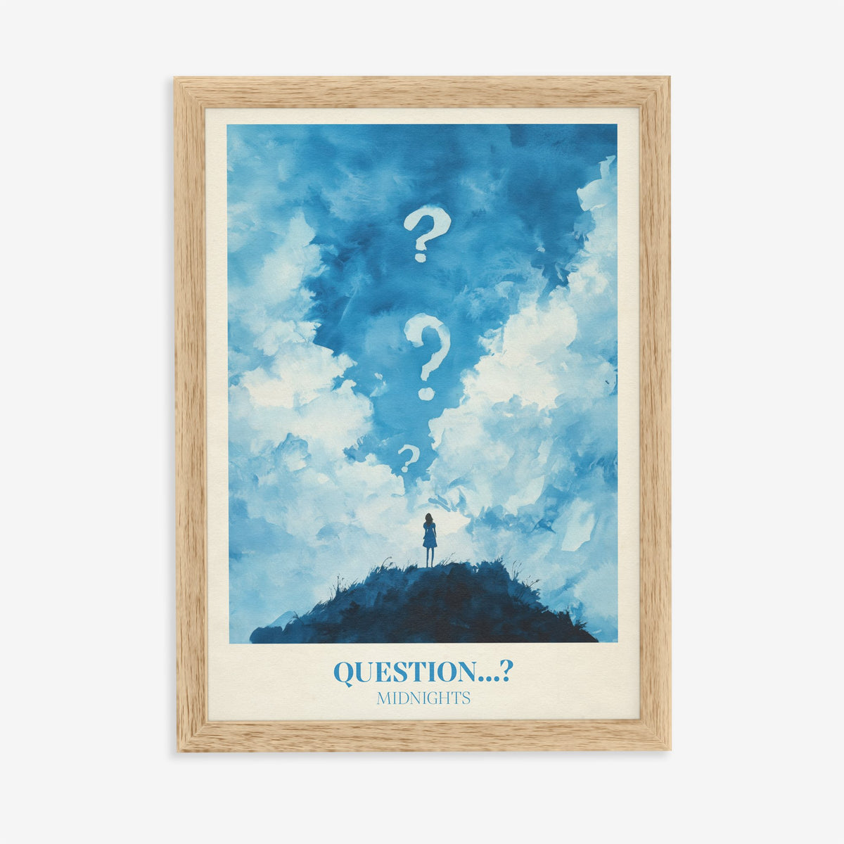 Question Taylor Swift print of a lone figure on a hill under clouds and question marks, in an oak frame on a plain wall