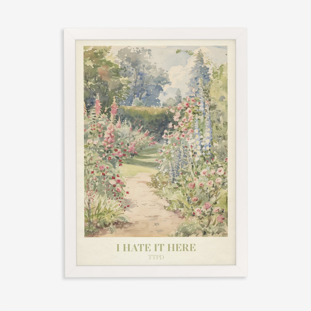 I Hate It Here Taylor Swift print of a garden path lined with foxgloves and roses, in a white frame on a plain wall