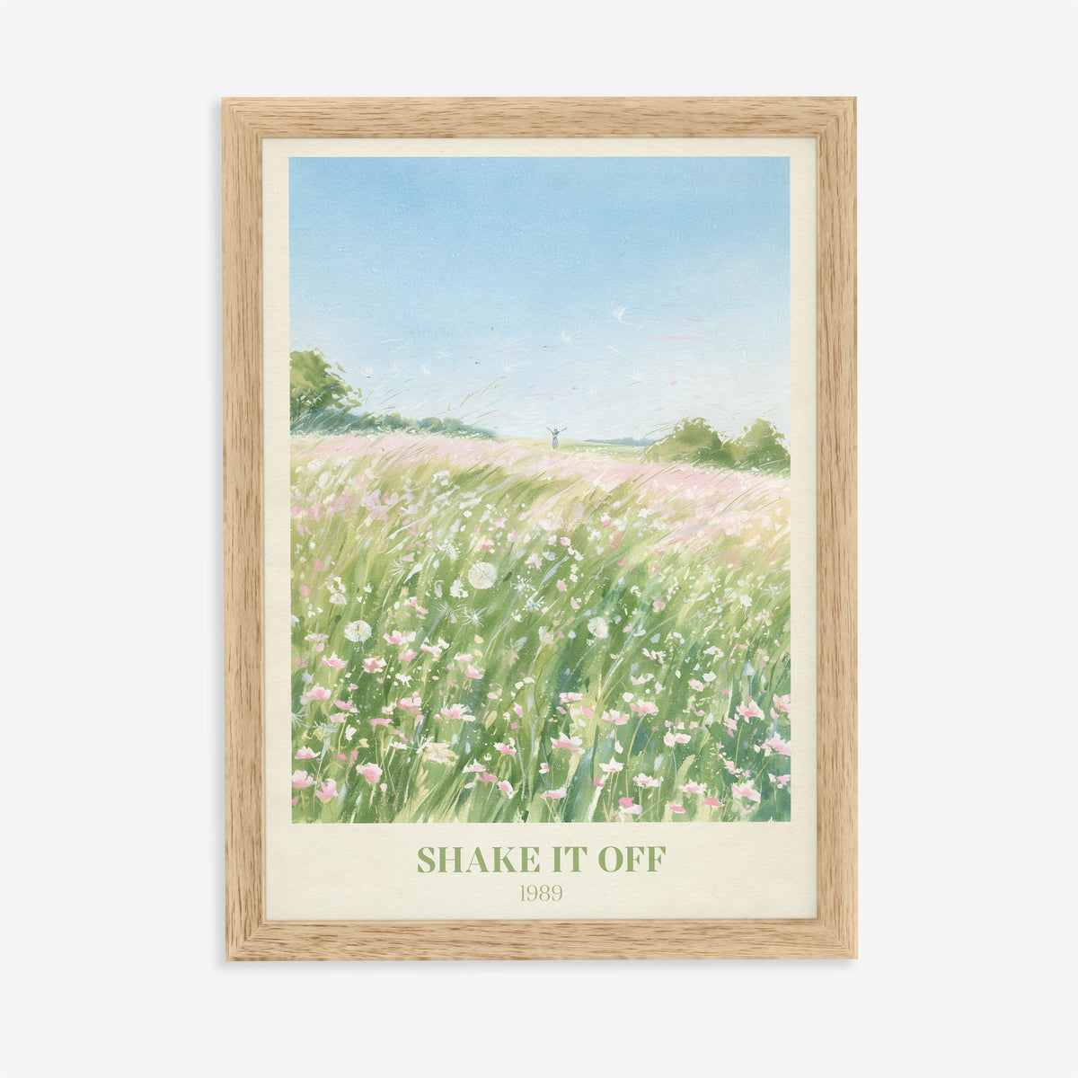 Shake It Off Taylor Swift print of a pink wildflower meadow, in an oak frame on a plain wall