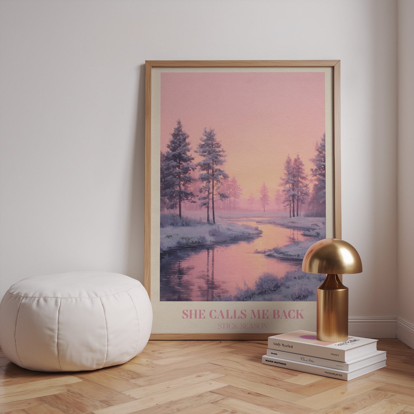 She Calls Me Back lyric wall art print inspired by Noah Kahan leaning against a white wall on wooden floor