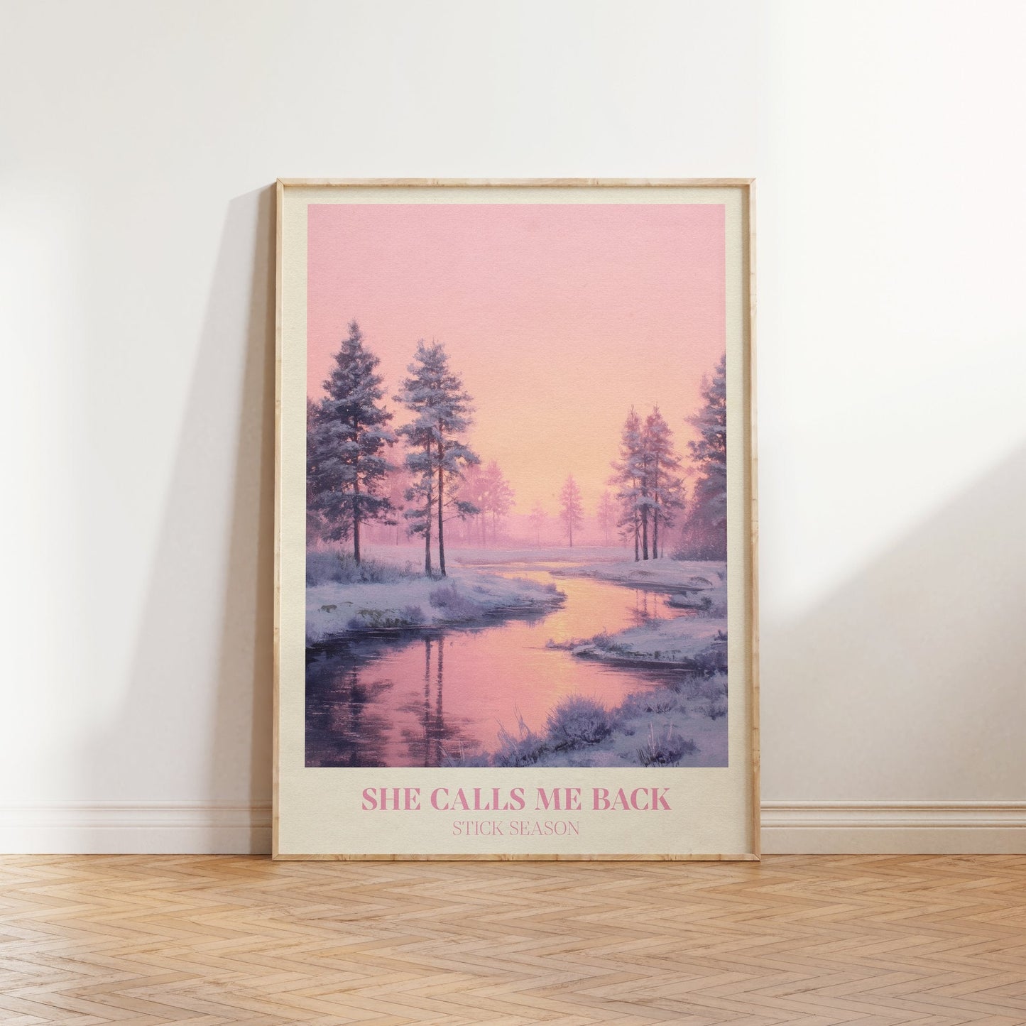 She Calls Me Back lyric print inspired by Noah Kahan leaning against a white wall on a wooden herringbone floor in soft daylight