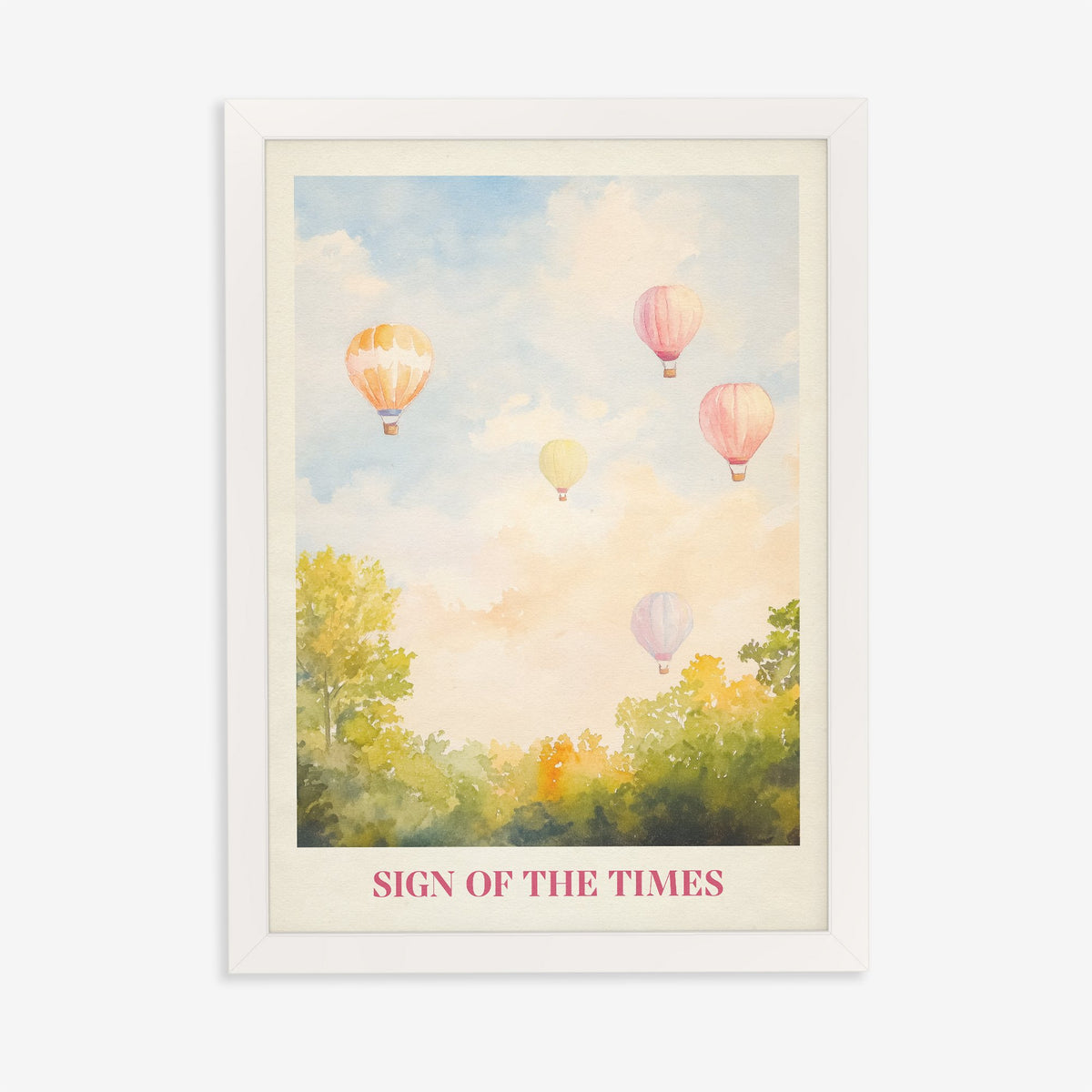 Sign Of The Times Harry Styles print of hot air balloons over trees in a pastel sky, in a white frame on a plain wall