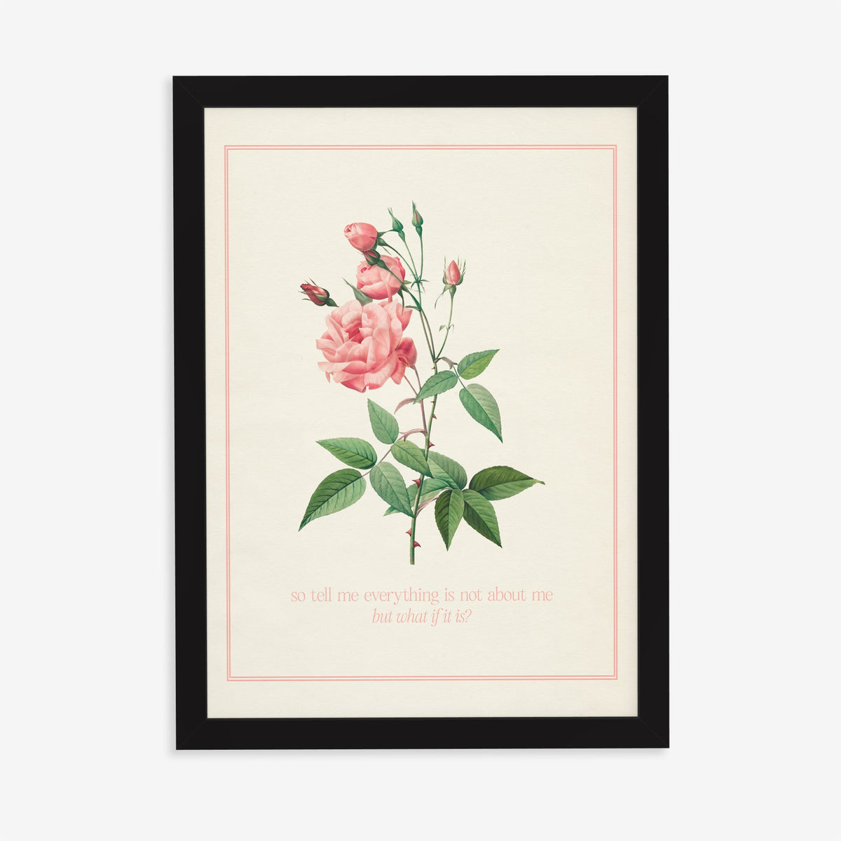 So Tell Me Everything Is Not About Me Taylor Swift print of a pink rose in a thin pink border, in a black frame on a plain wall