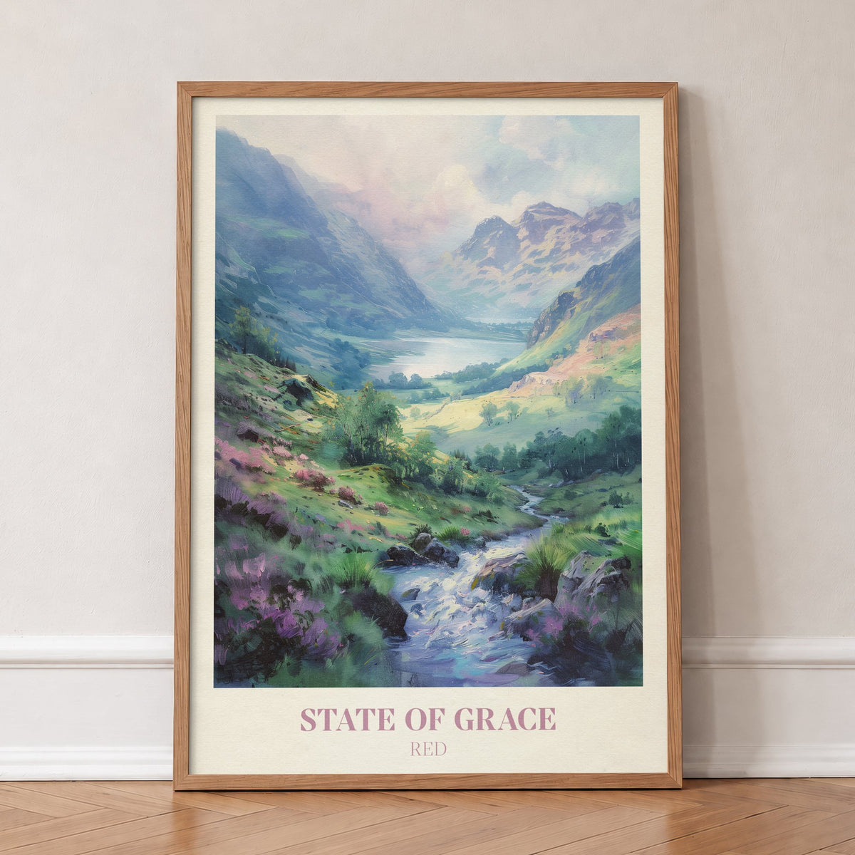State Of Grace Taylor Swift print of a heather-covered valley with a stream and distant lake, in an oak frame, leaning against a wall on a herringbone floor