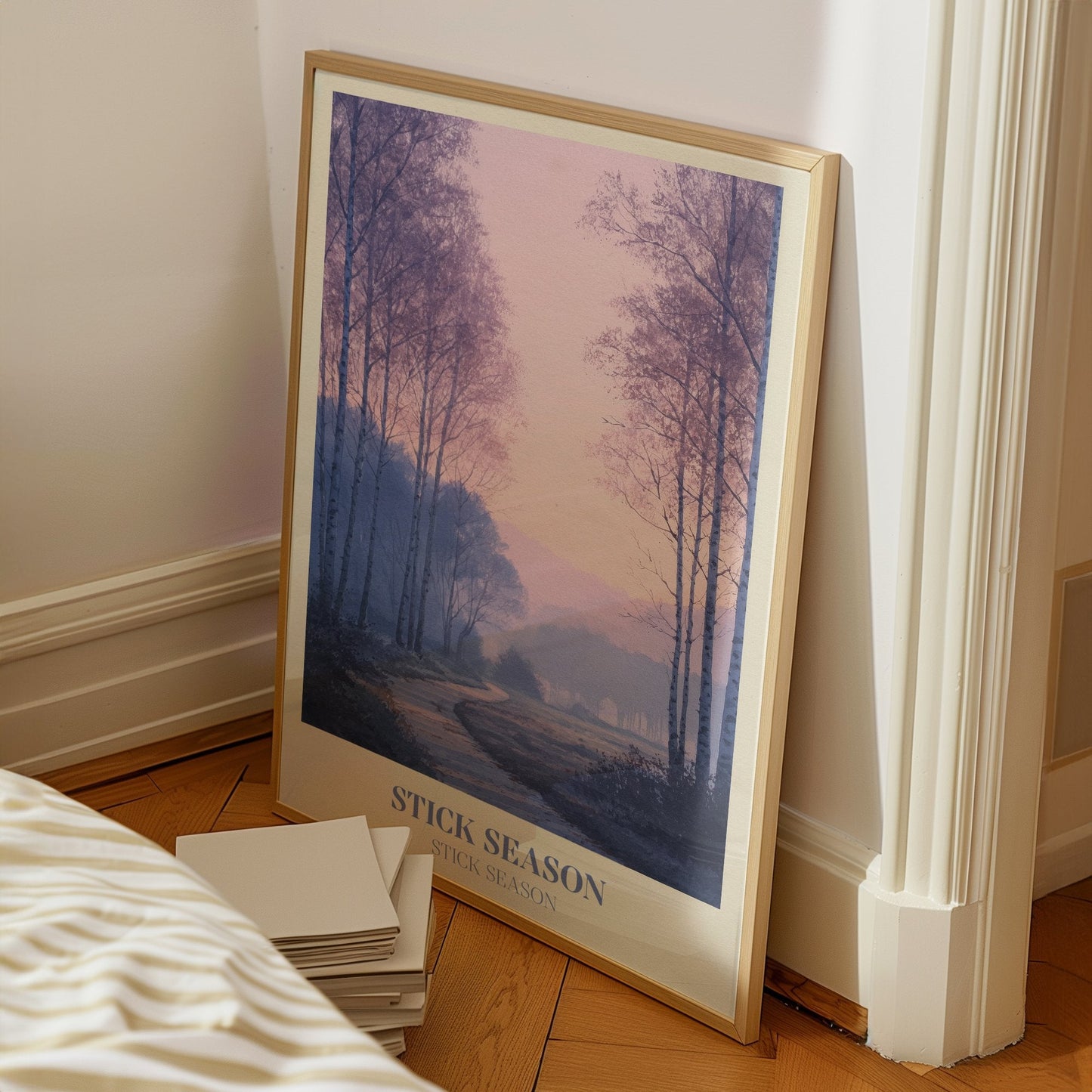 Stick Season lyric wall art print inspired by Noah Kahan on a bedroom floor, leaning against a white wall