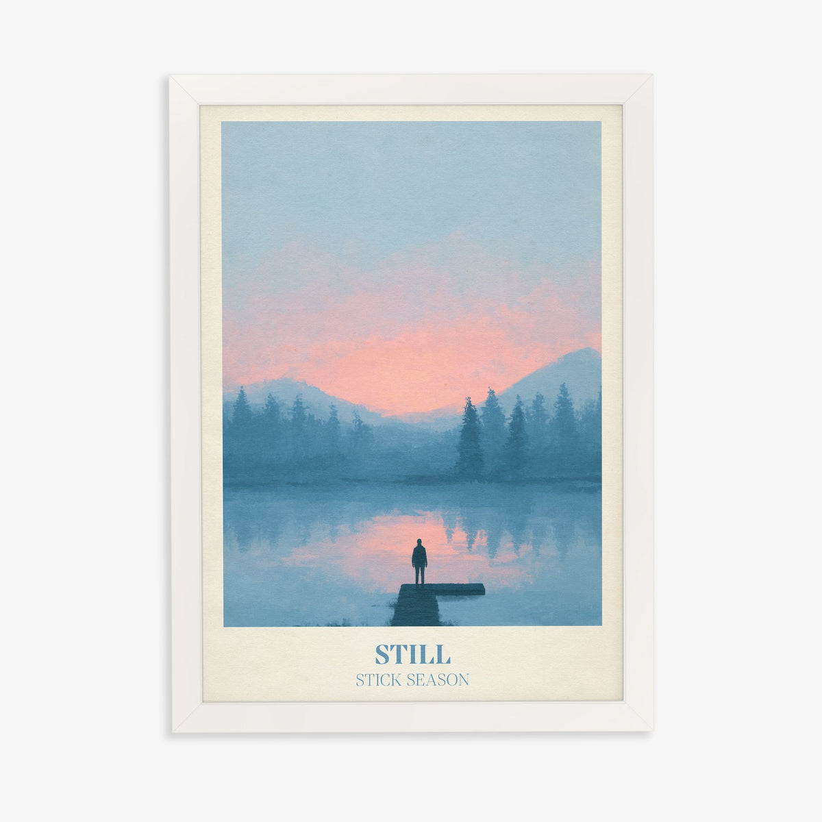 Still Noah Kahan print of a lone figure on a jetty over a pink and blue lake, in a white frame on a plain wall