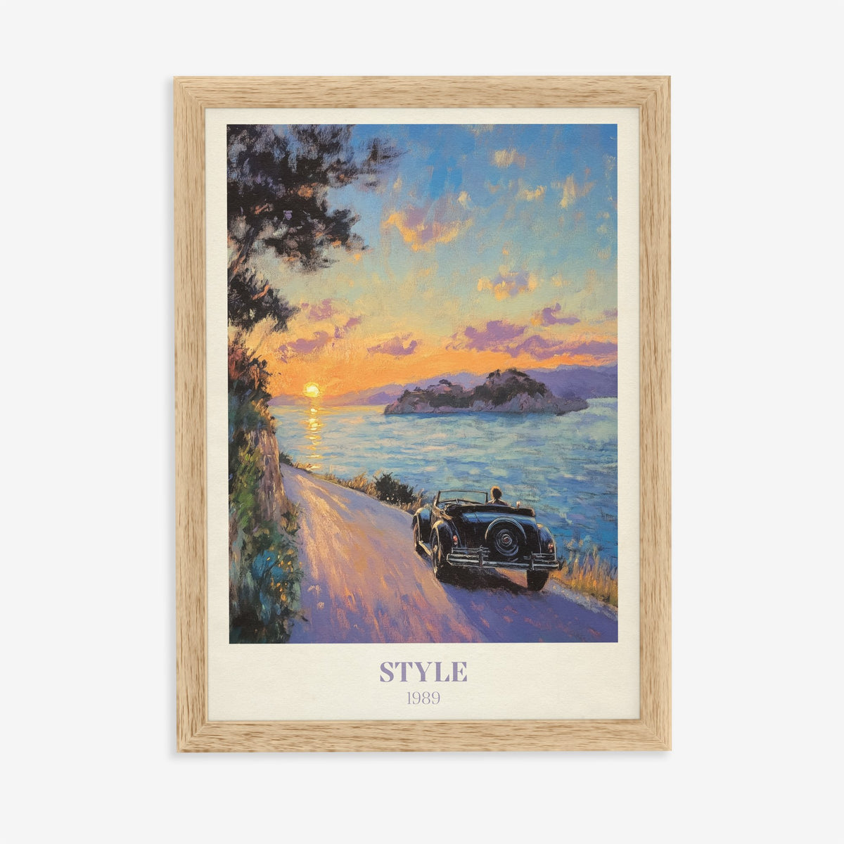 Style Taylor Swift print of a vintage convertible on a coastal road at sunset, in an oak frame on a plain wall