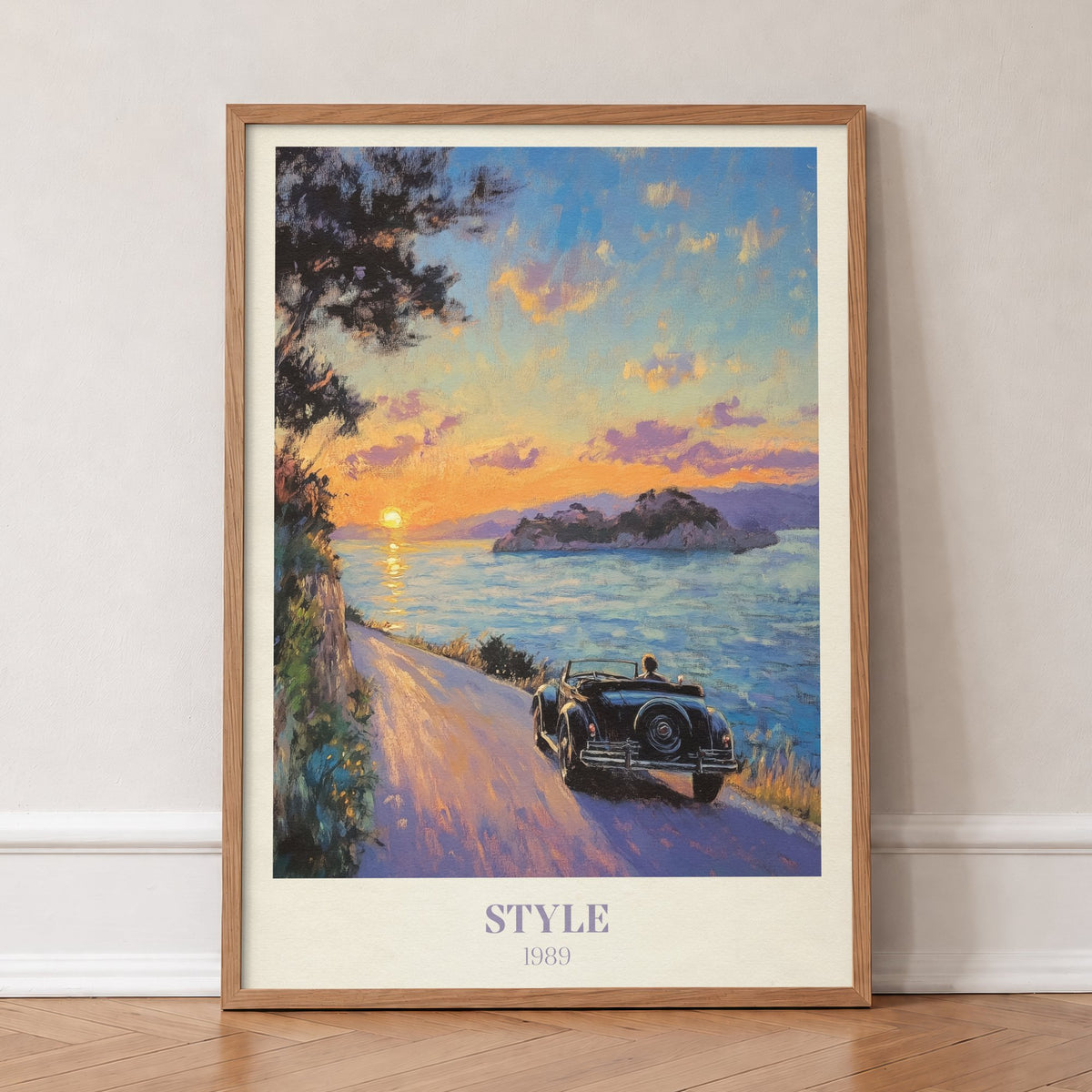 Style Taylor Swift print of a vintage convertible on a coastal road at sunset, in an oak frame, leaning against a wall on a herringbone floor