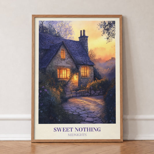 Sweet Nothing Evening Cottage Taylor Swift print of a stone cottage with glowing windows at dusk, in an oak frame, leaning against a wall on a herringbone floor