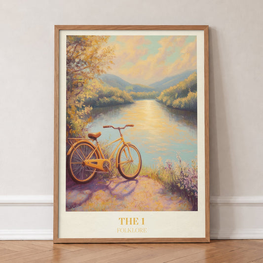 The 1 Taylor Swift print of a yellow bicycle beside a sunlit river, in an oak frame, leaning against a wall on a herringbone floor