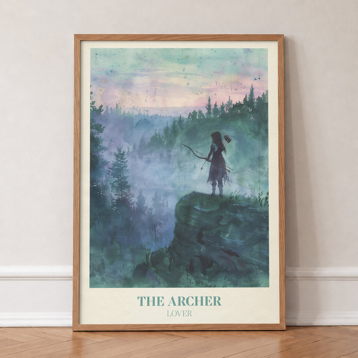 The Archer Taylor Swift print of an archer on a misty clifftop above a pine forest at dawn, in an oak frame, leaning against a wall on a herringbone floor