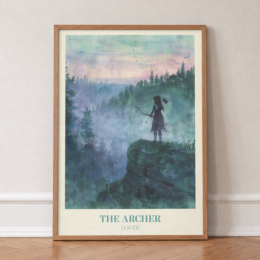 The Archer Taylor Swift print of an archer on a misty clifftop above a pine forest at dawn, in an oak frame, leaning against a wall on a herringbone floor