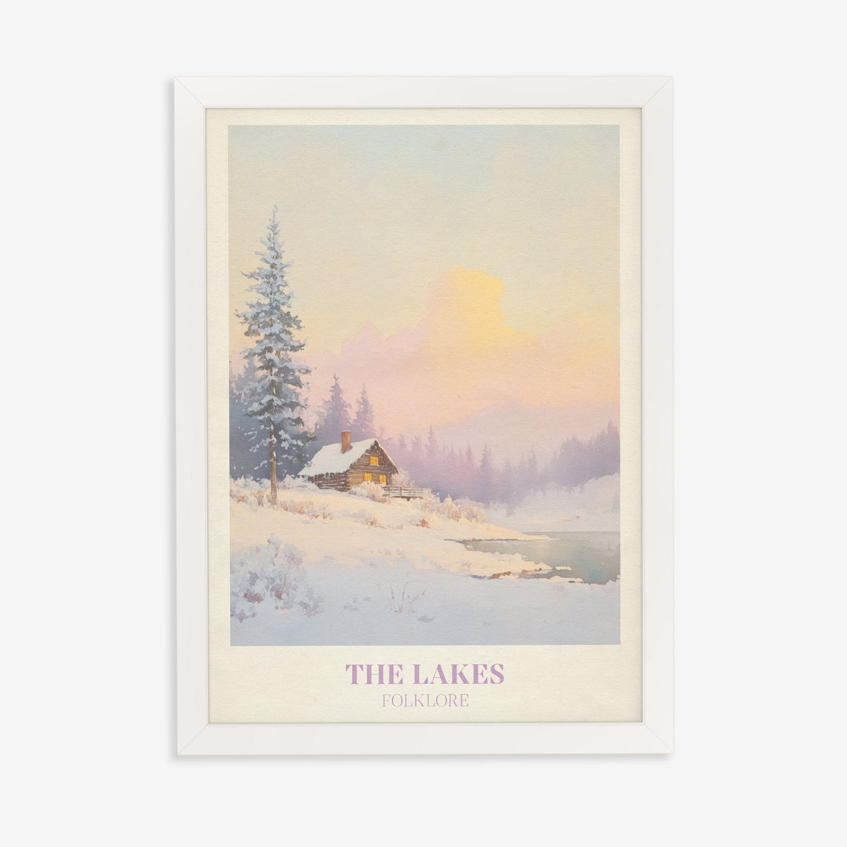 The Lakes Christmas Taylor Swift print of a snowy log cabin by a lake under a pink sky, in a white frame on a plain wall