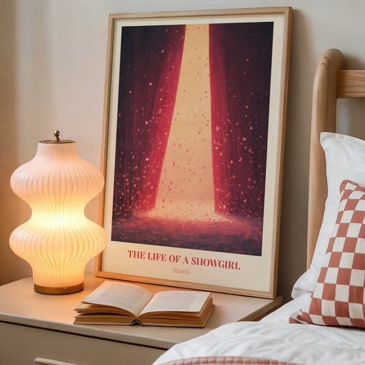 The Life Of A Showgirl lyric wall art print inspired by Taylor Swift on a bedside table next to a lamp