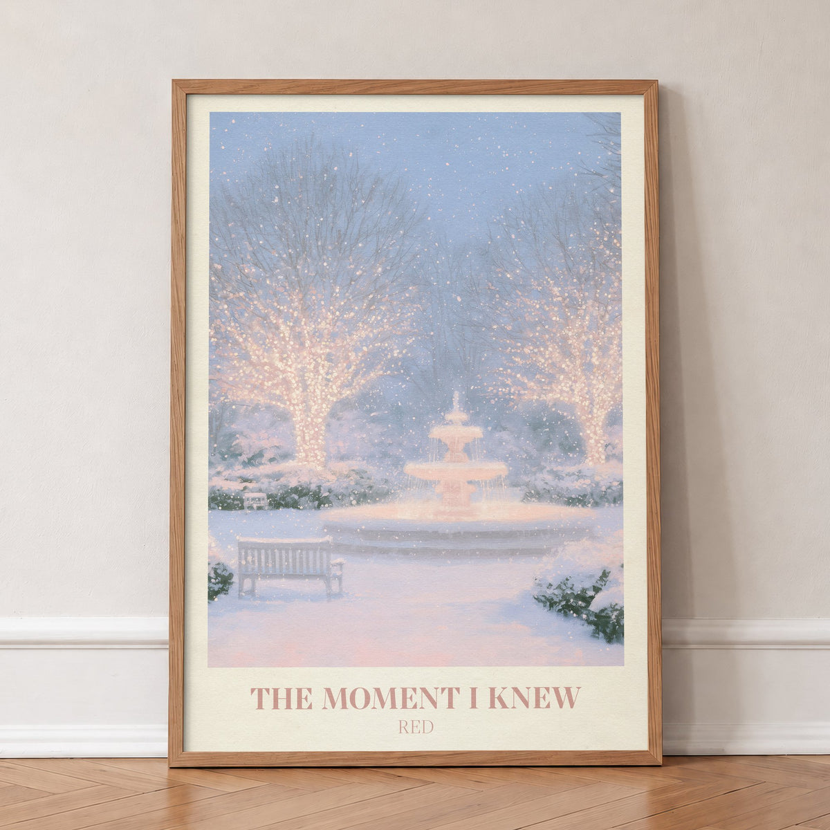 The Moment I Knew Taylor Swift print of a fairy-lit snowy park, in an oak frame, leaning against a wall on a herringbone floor