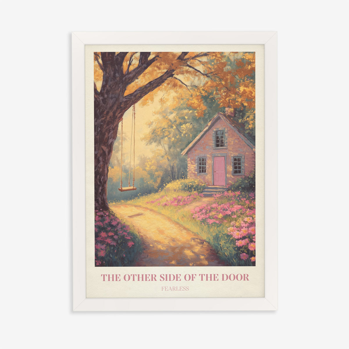 The Other Side Of The Door Taylor Swift print of a brick cottage with a pink door and a tree swing, in a white frame on a plain wall