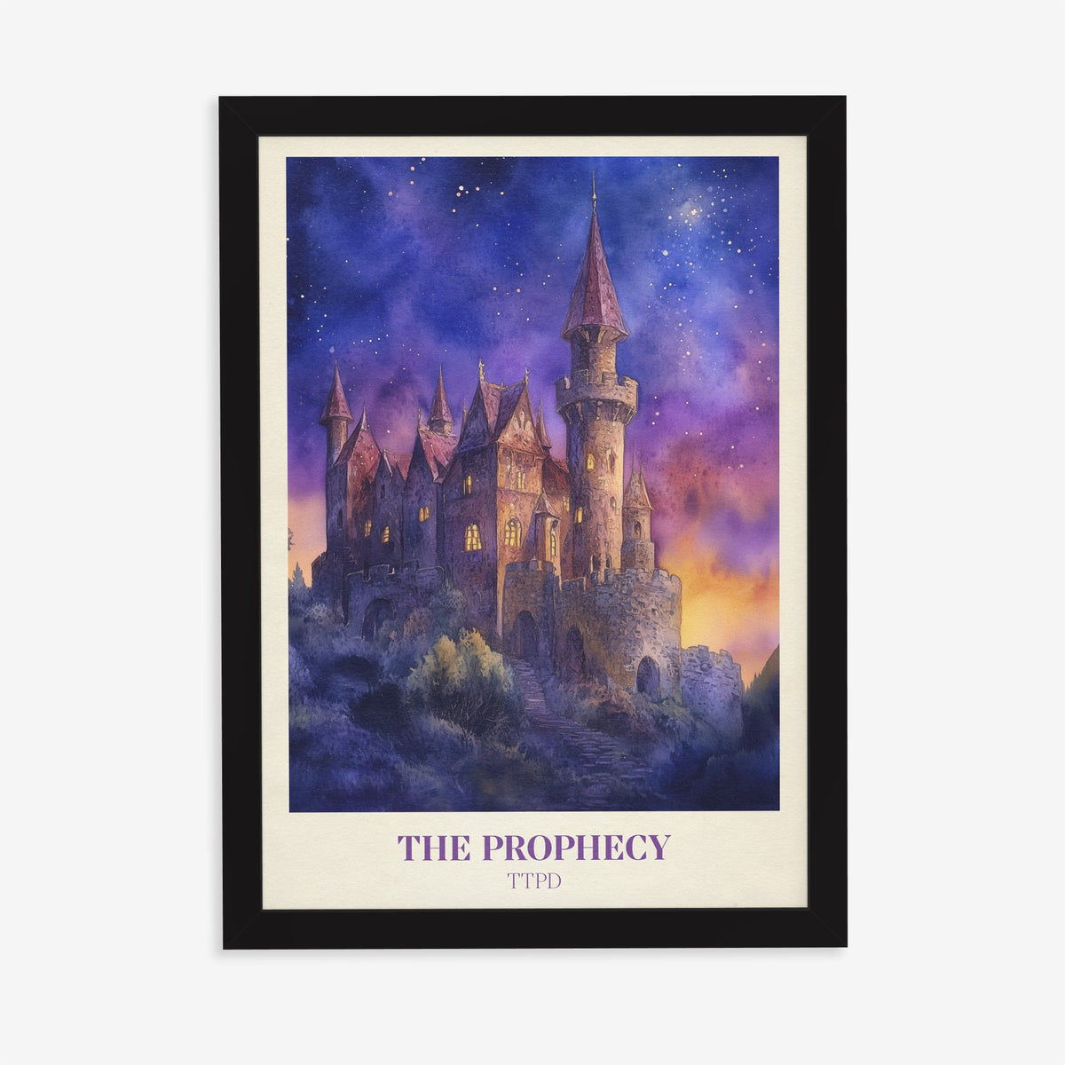 The Prophecy Taylor Swift print of a castle under a starry purple and orange sky, in a black frame on a plain wall