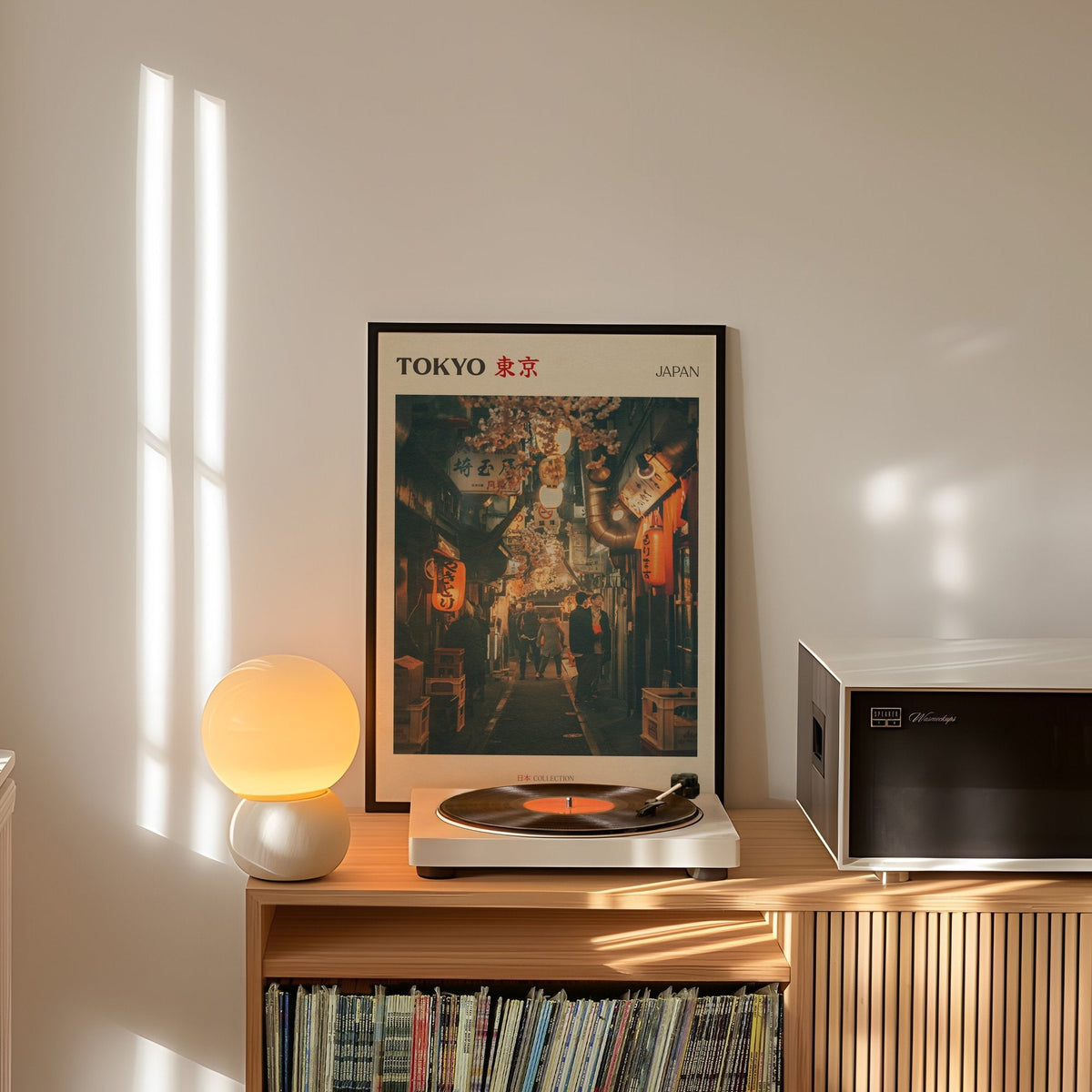 Tokyo print on a shelf with a record player
