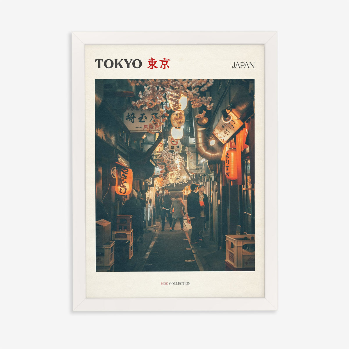 Tokyo travel print of a narrow side street at night lit by red paper lanterns, in a white frame on a plain wall